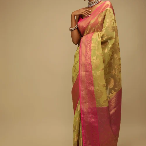 Celery Green Saree In Organza Silk With Golden Brocade Woven Floral Jaal And Magenta Border Design